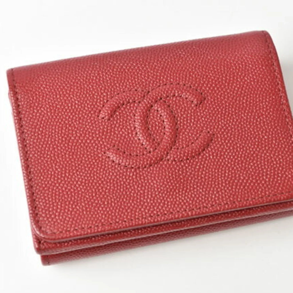 Pre-Owned Chanel wallet  here mark caviar skin dark red (Like New)