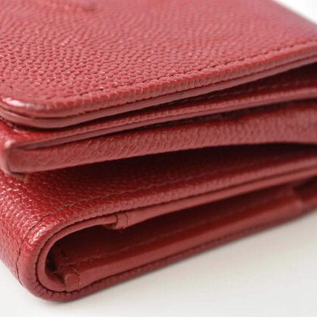 Pre-Owned Chanel wallet  here mark caviar skin dark red (Like New)