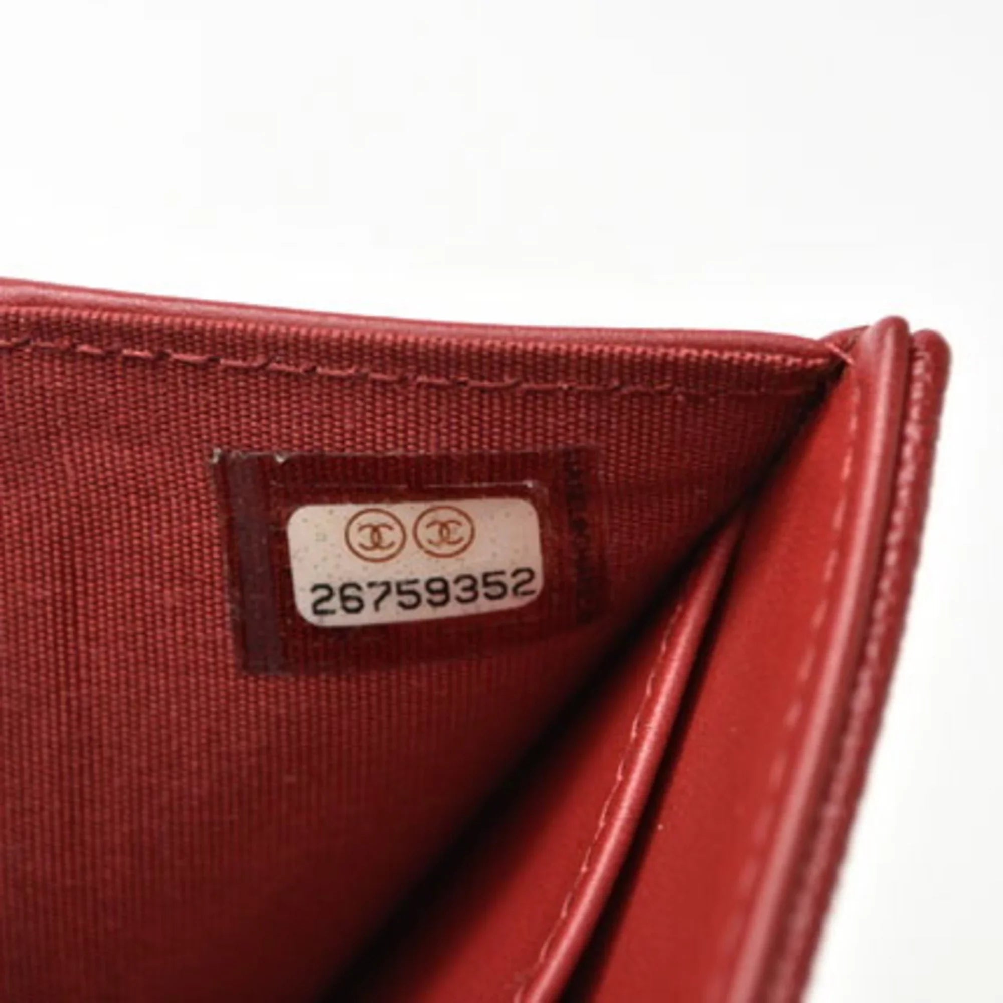 Pre-Owned Chanel wallet  here mark caviar skin dark red (Like New)