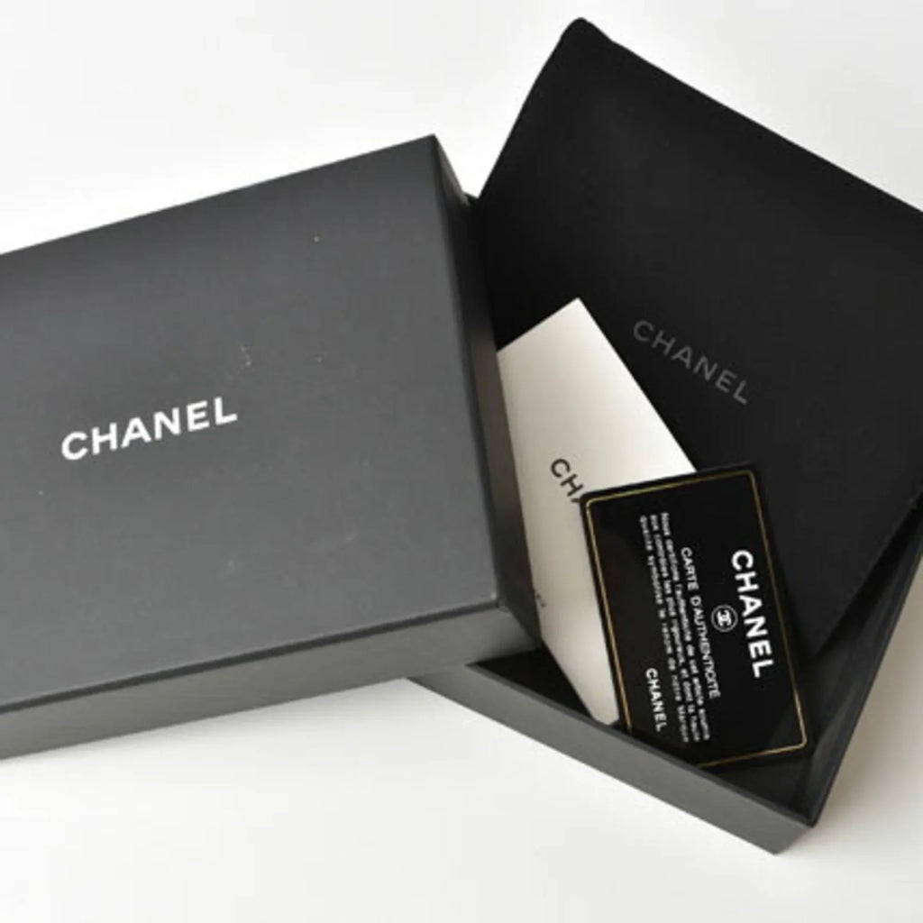 Pre-Owned Chanel wallet  here mark caviar skin dark red (Like New)